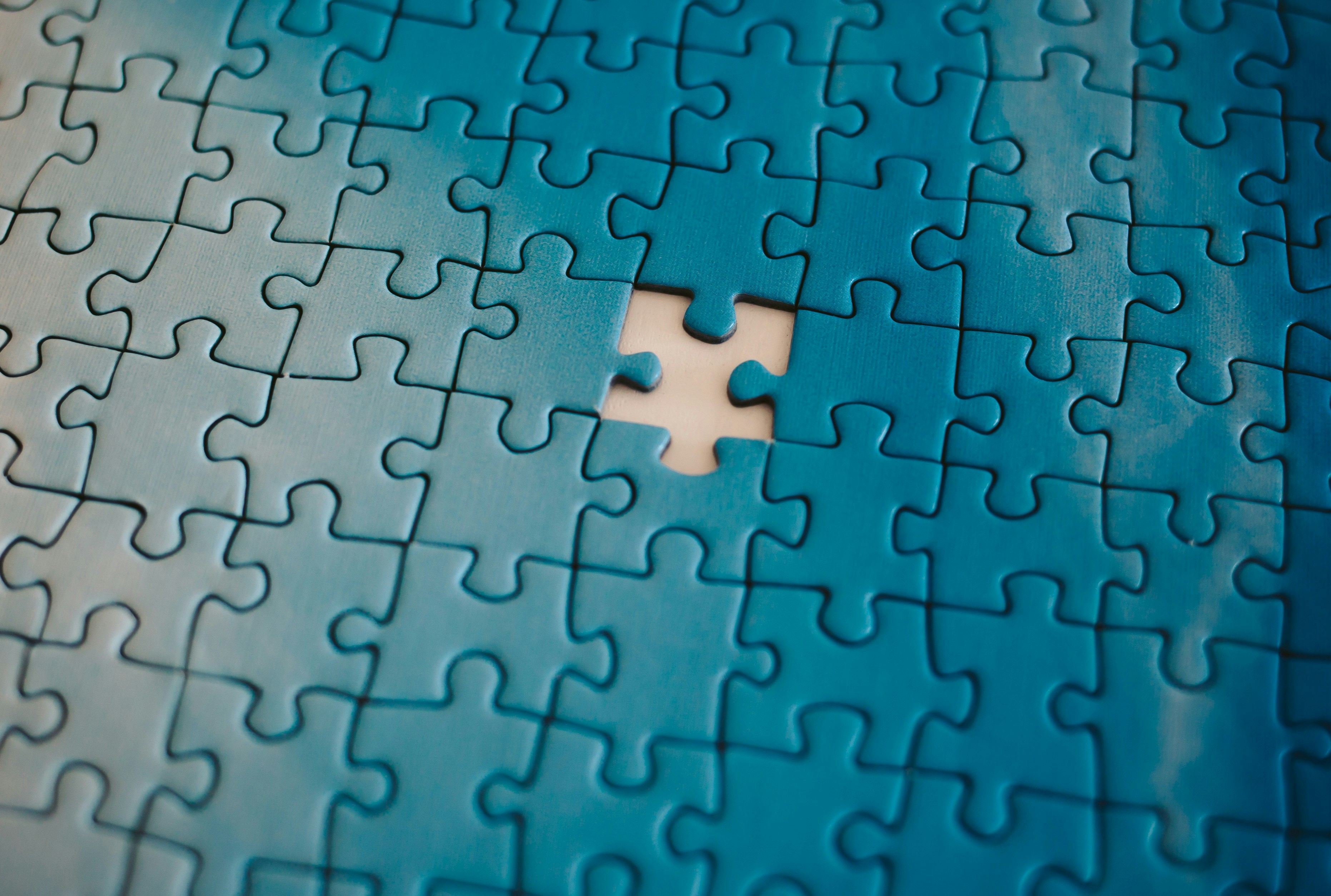 A puzzle with a missing piece.